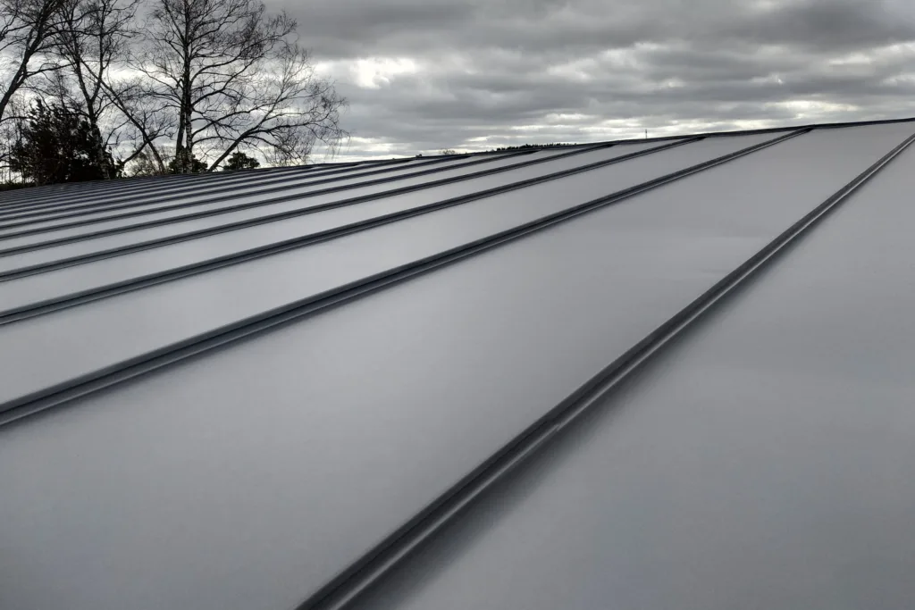 Gray standing seam metal roof panels